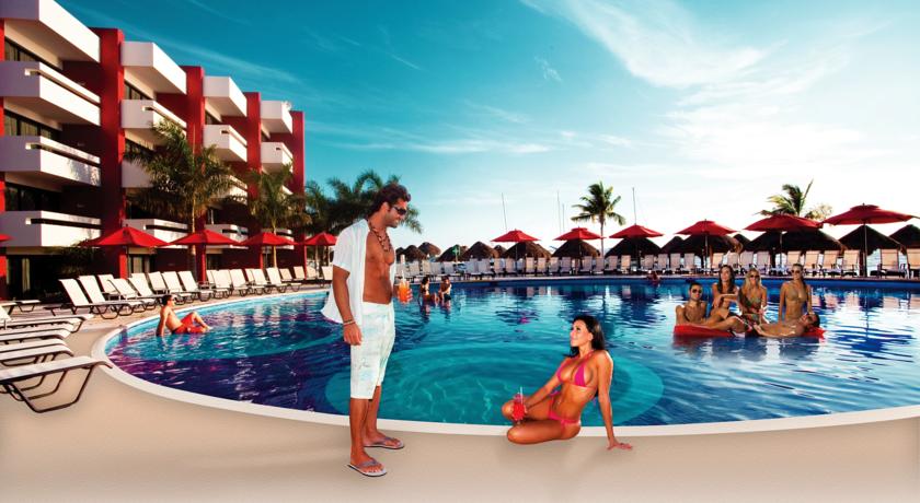 Young couples poolside at Temptation Resort Spa